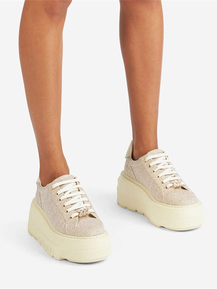 CASADEI pair of beige platform sneakers worn by a woman